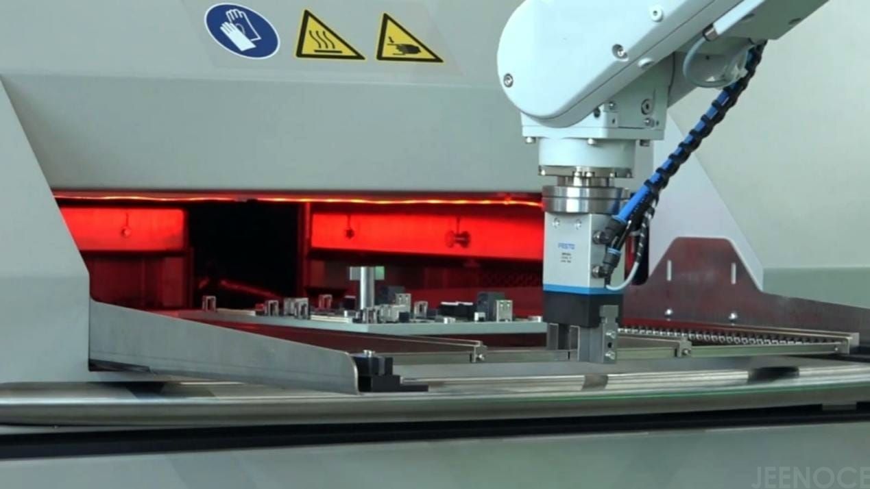 Automated convection reflow soldering machine in operation, representing JEENOCE’s tailored systems for factories Automated convection reflow soldering machine in operation, representing JEENOCE’s tailored systems for factories.jpg